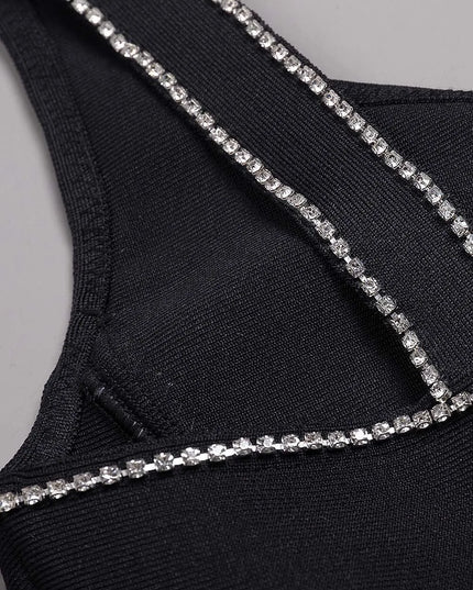 Robe longue à bandage avec des détails en cristal sur le cœur preta.