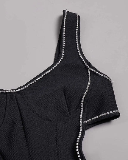 Robe longue à bandage avec des détails en cristal sur le cœur preta.